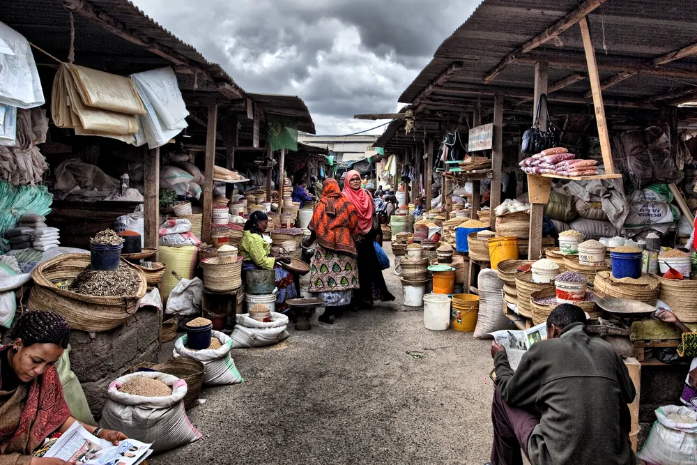 Traders and produce inside Arusha's central market