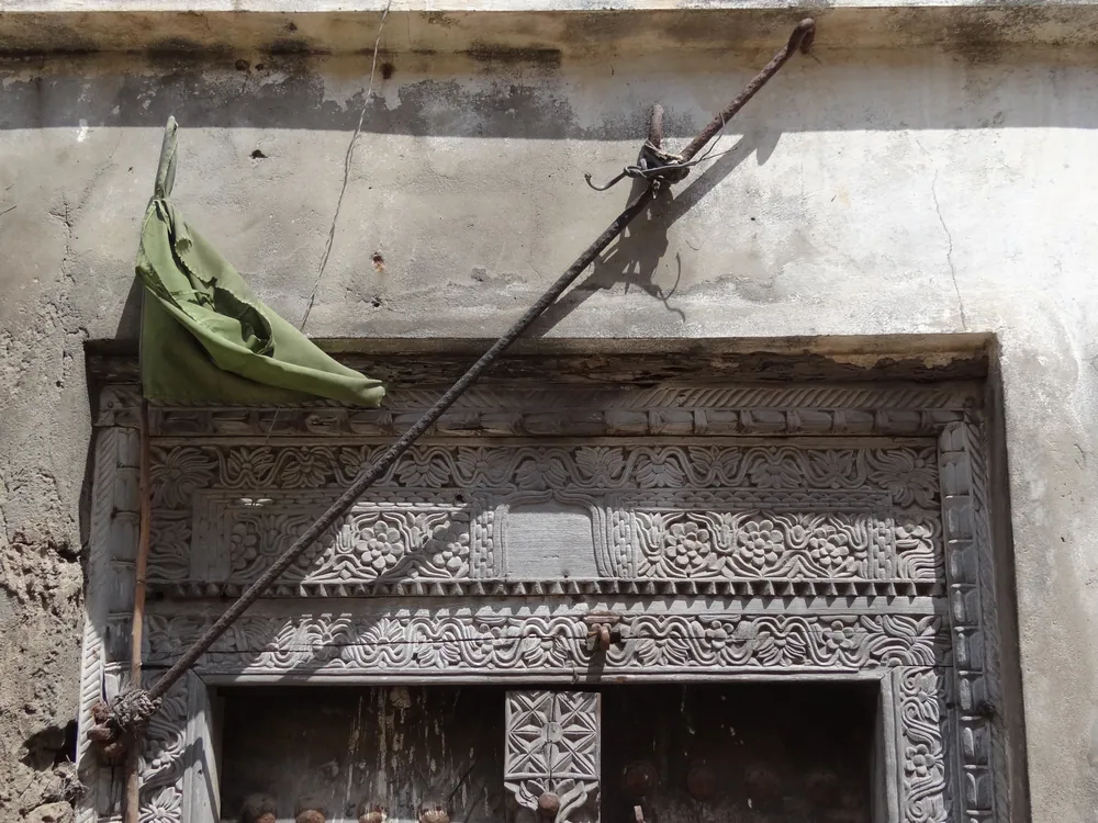 A carved doorframe surviving on a Bagamoyo house