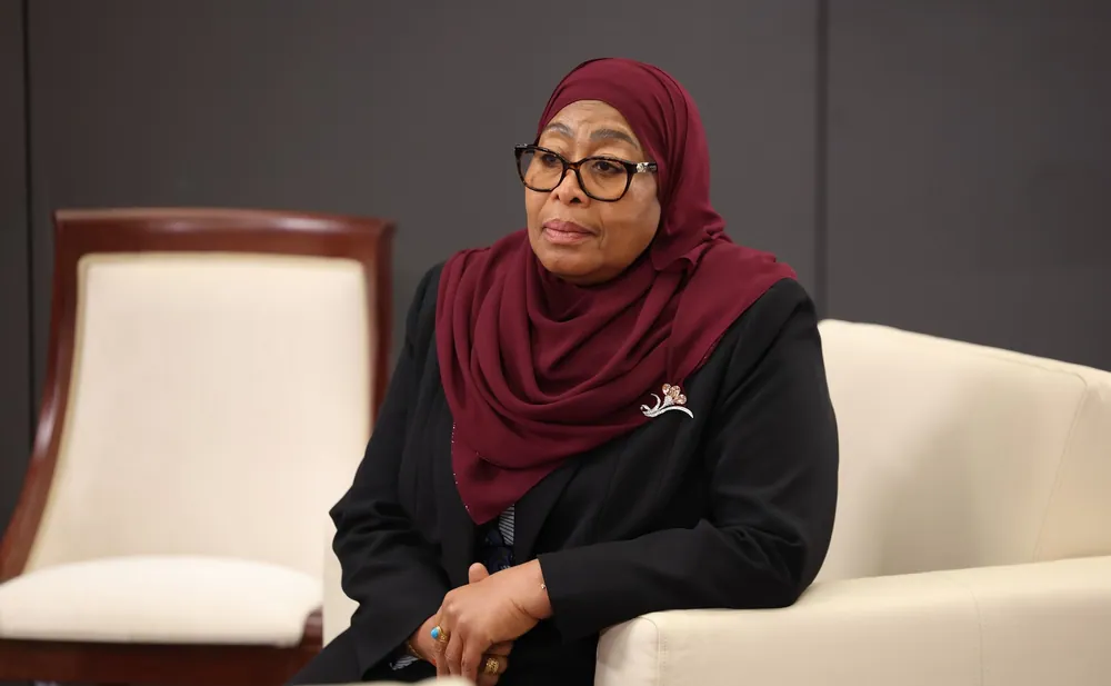 Samia Suluhu Hassan seated before a session of an economic forum