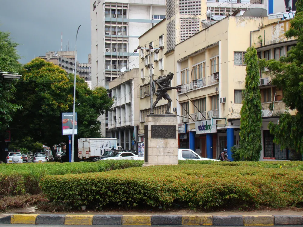 The bronze Askari Monument on its stone pedestal at a roundabout in central Dar es Salaam