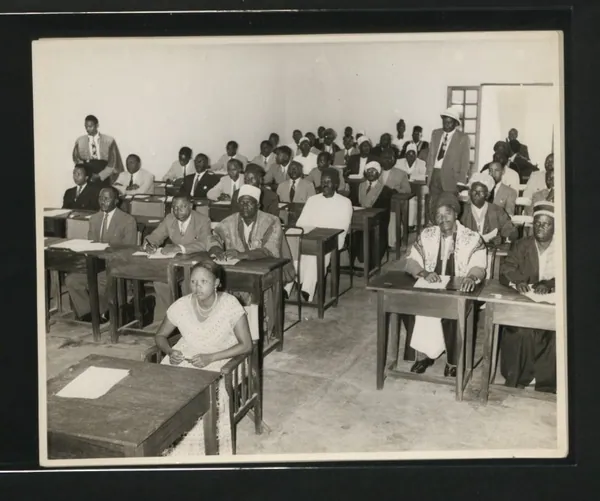 Chiefs seated at school desks in session at Mzumbe, Morogoro, during the first Chiefs' Conference, May 1957