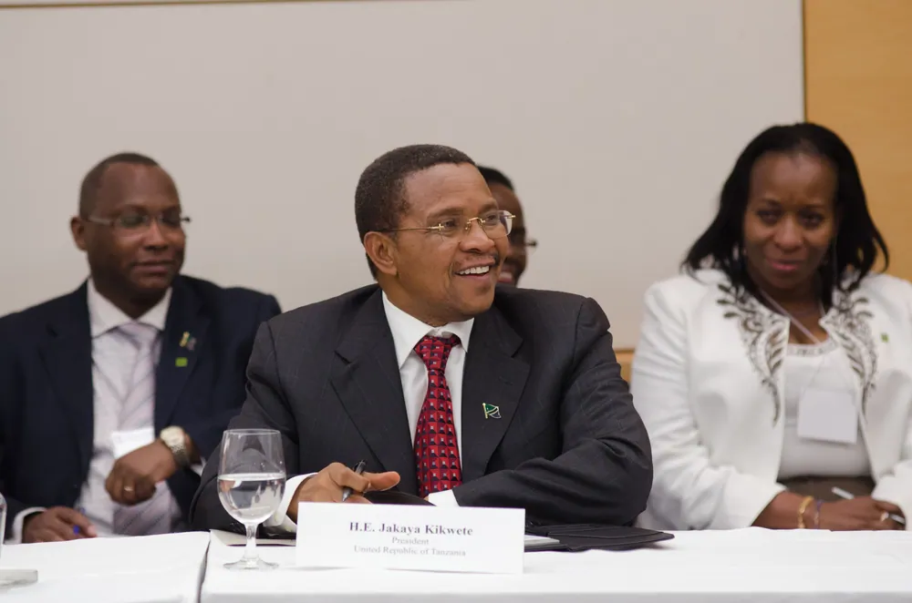 Jakaya Kikwete speaking at a conference table
