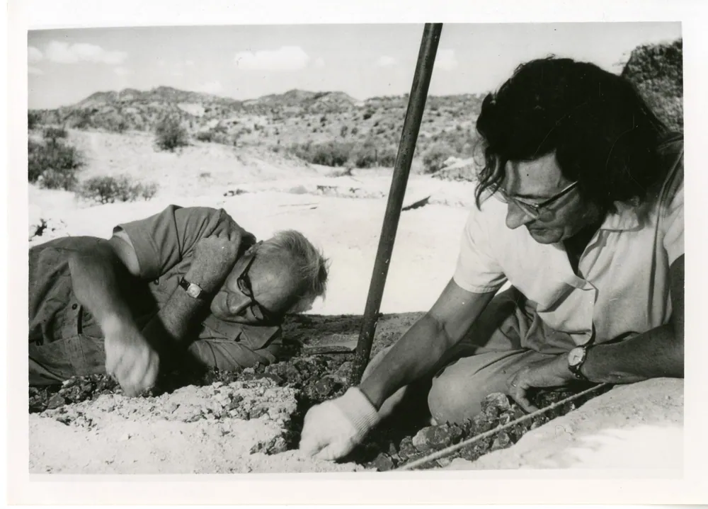 Louis and Mary Leakey digging at Olduvai Gorge.