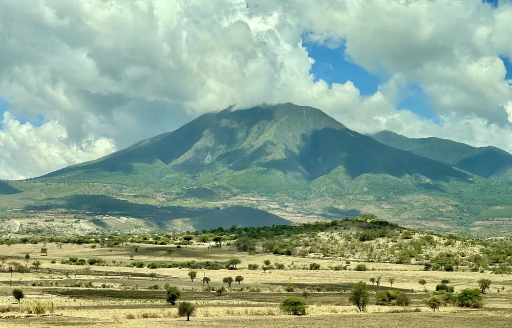 Mount Hanang rising above farmland, seen from Mogitu