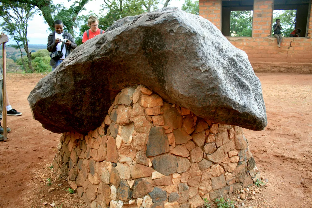 The Mbozi meteorite on its stone plinth, Mbeya Region