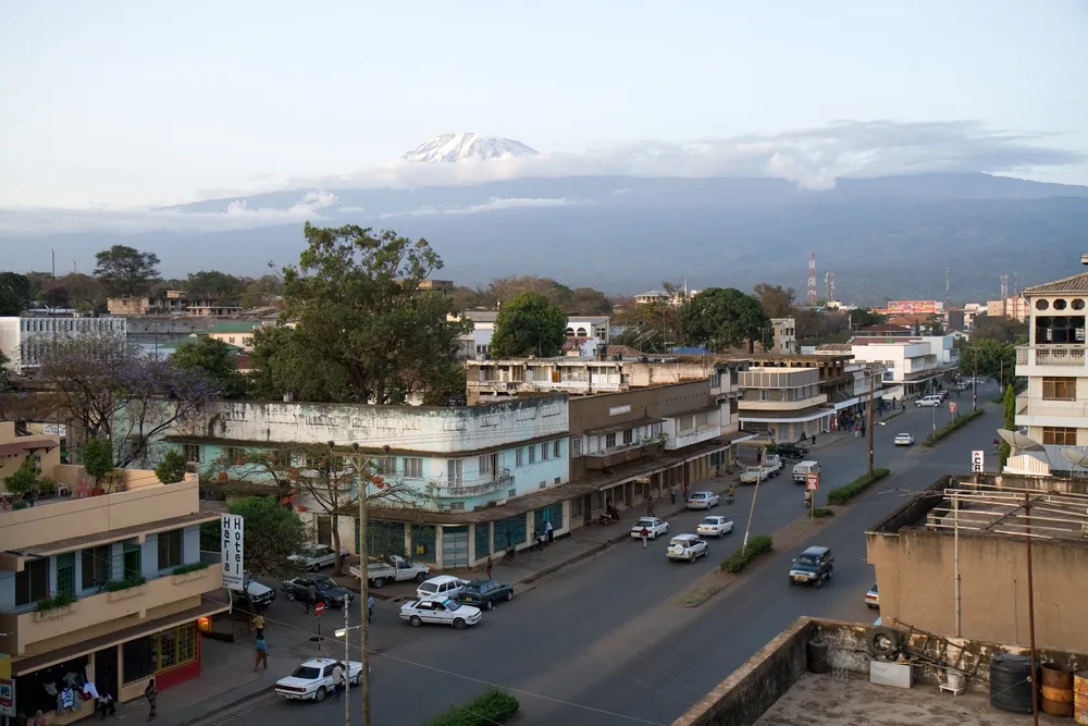 Kilimanjaro standing above the rooftops of Moshi