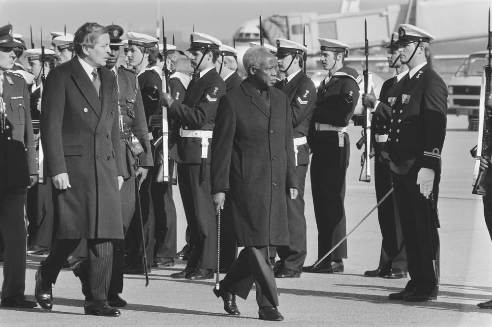 President Nyerere inspects a guard of honour at Schiphol, the Netherlands, in March 1985, his last year in office