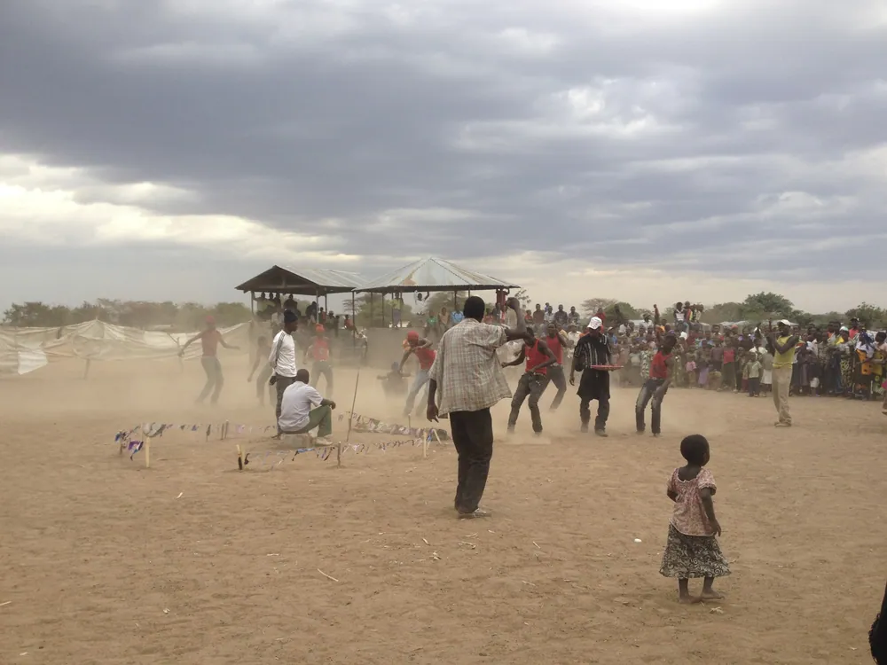 Dust raised by dancers at a Sukuma gathering
