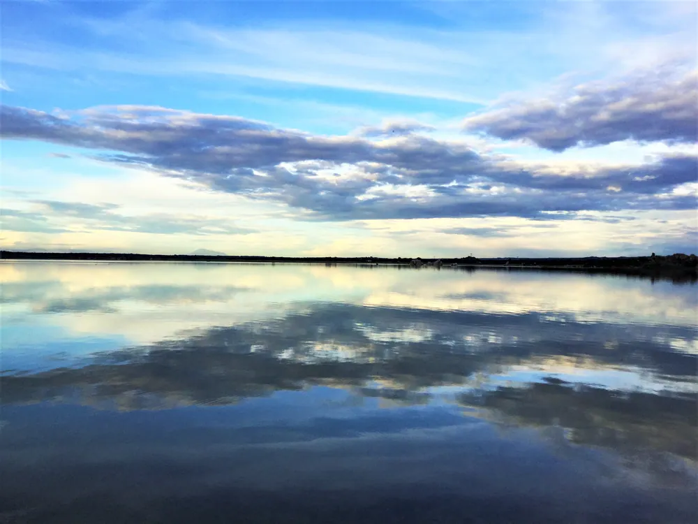 Clouds reflected in Lake Singidani, beside Singida town