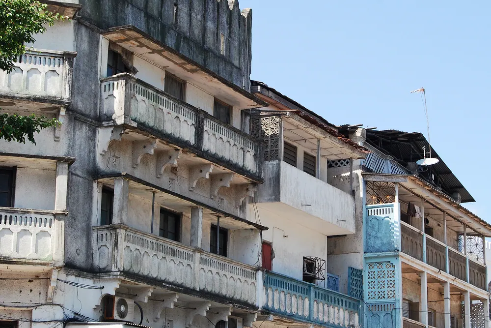 Balconied facades along a Stone Town street